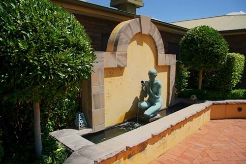Water feature with sculpture